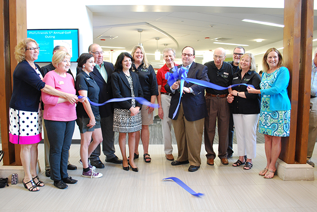 Ribbon cutting at Library grand reopening celebration