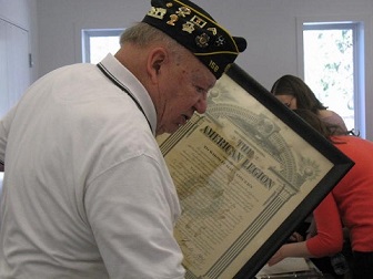 Legion Member with Poster