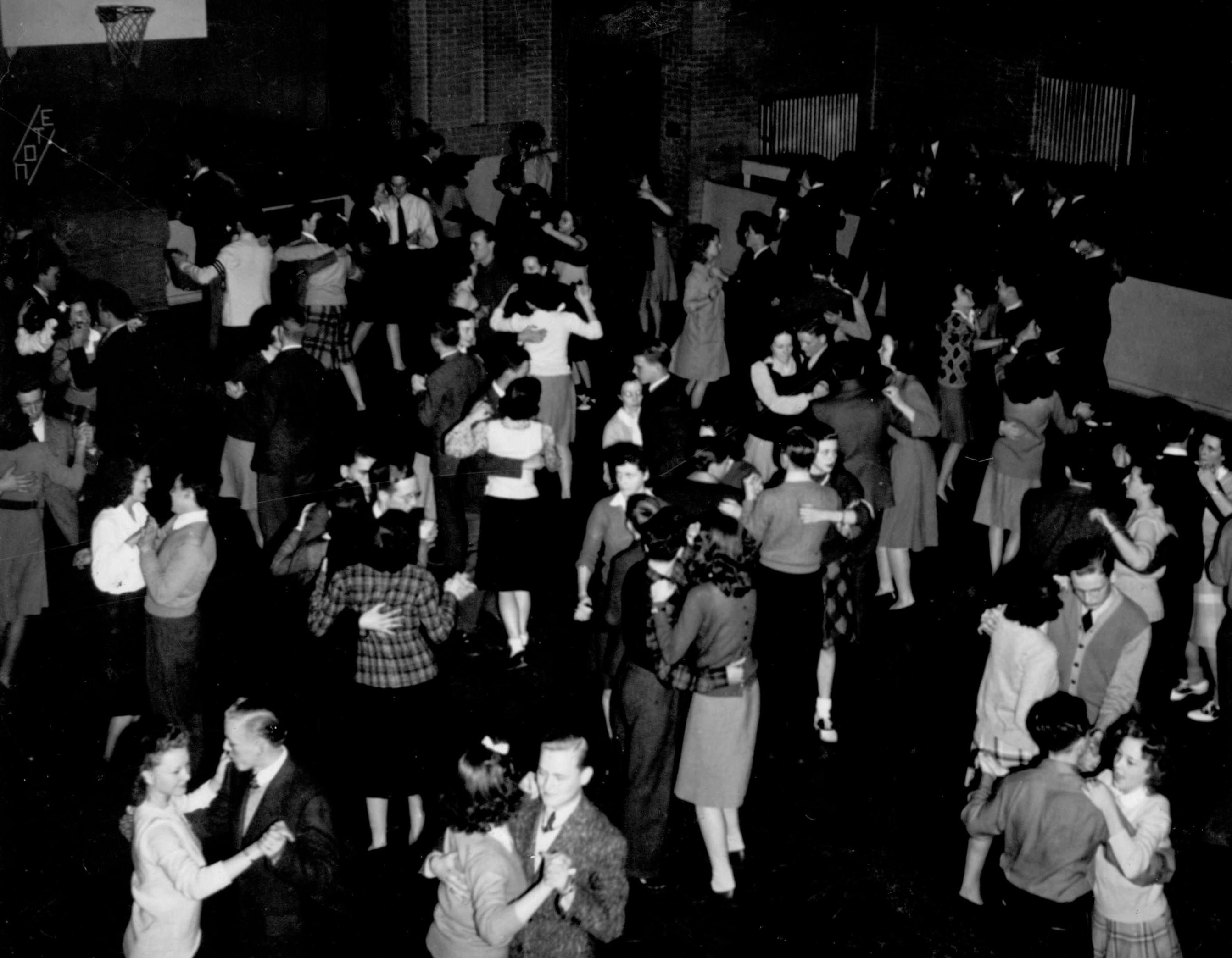 Reunion photograph from the BHS Class of 1943. Barrington High School, Hough Street gym, 1942 - click to enlarge.